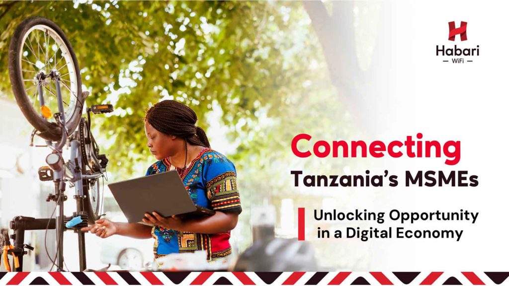 Focused female mechanic studying an online repair tutorial on a laptop while inspecting a bicycle, powered by business internet solutions in Tanzania.